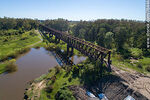 Vista aérea del puente ferroviario reticulado de hierro que cruza el río Yí hacia Santa Bernardina - Foto #76446